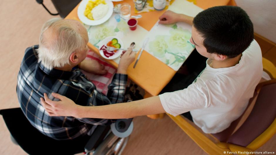 Germany's Coalition Commits to Care System Reform Amid Police Raids