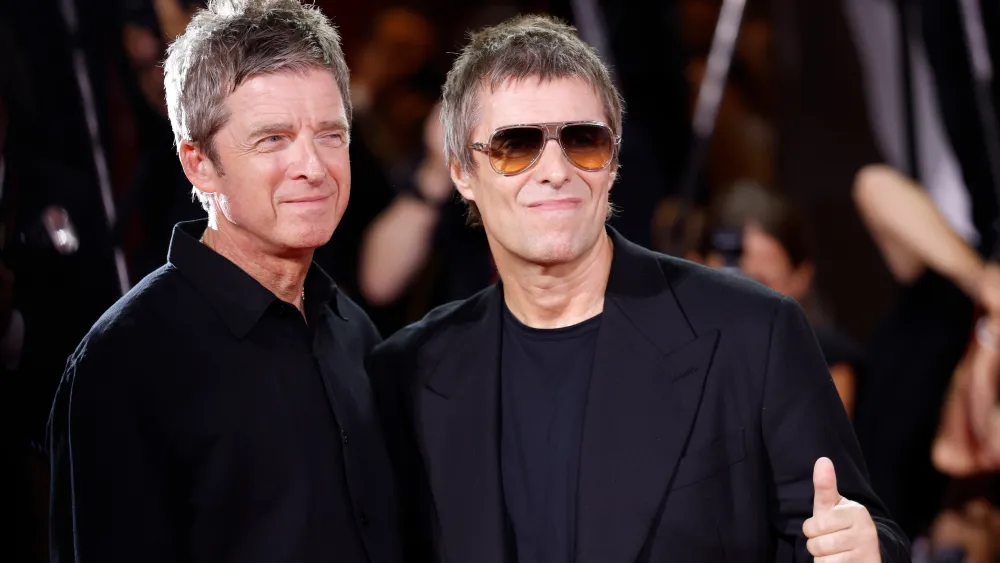 Liam and Noel Gallagher Light Up Venice with Oasis Doc Ovation