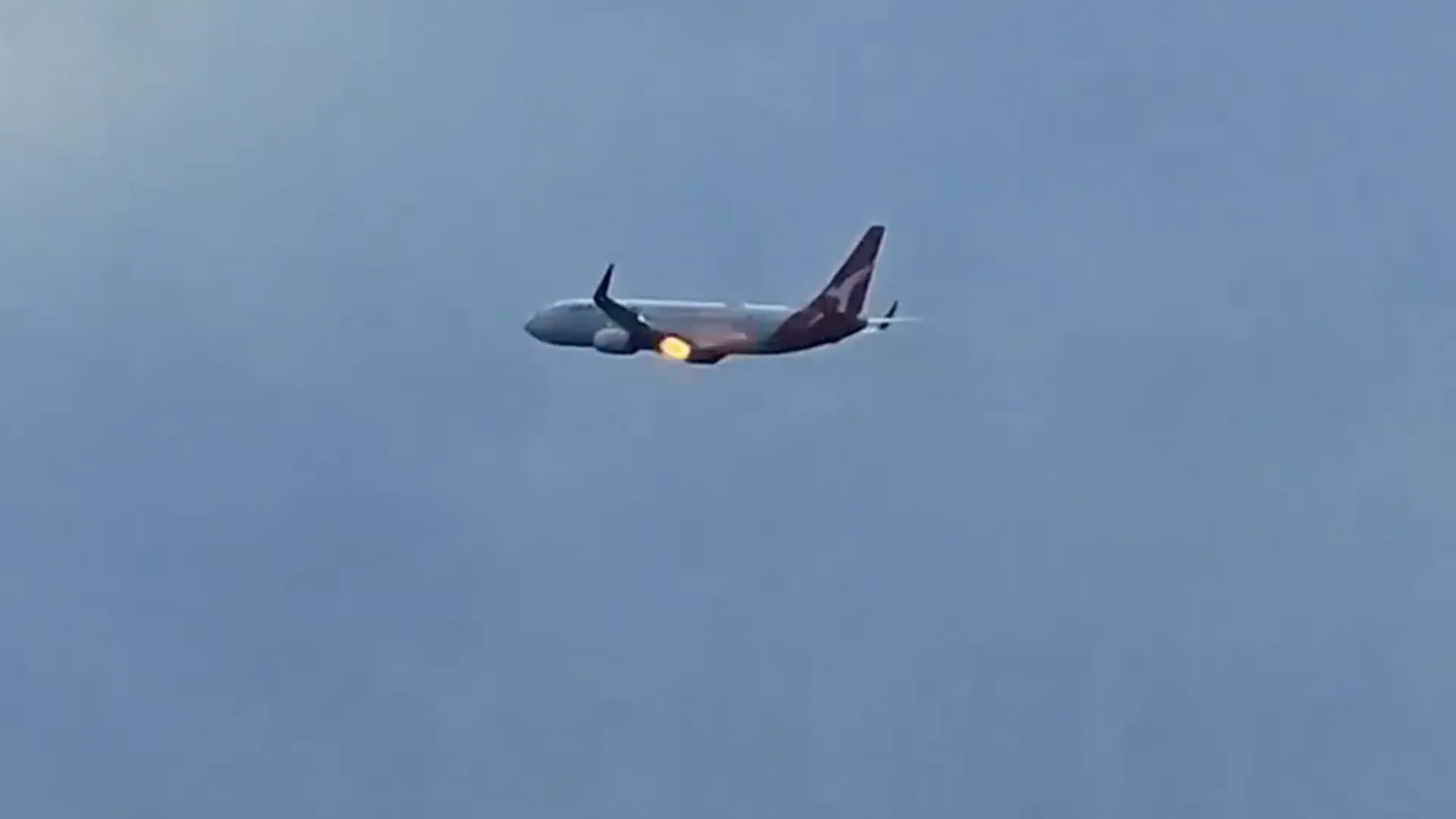 Flames erupt from Qantas plane engine after New Zealand takeoff