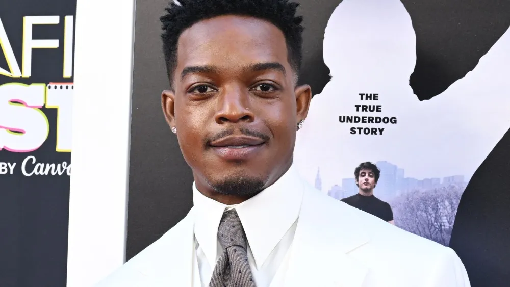 Stephan James Honors Carl Weathers in White Suit at AFI Fest
