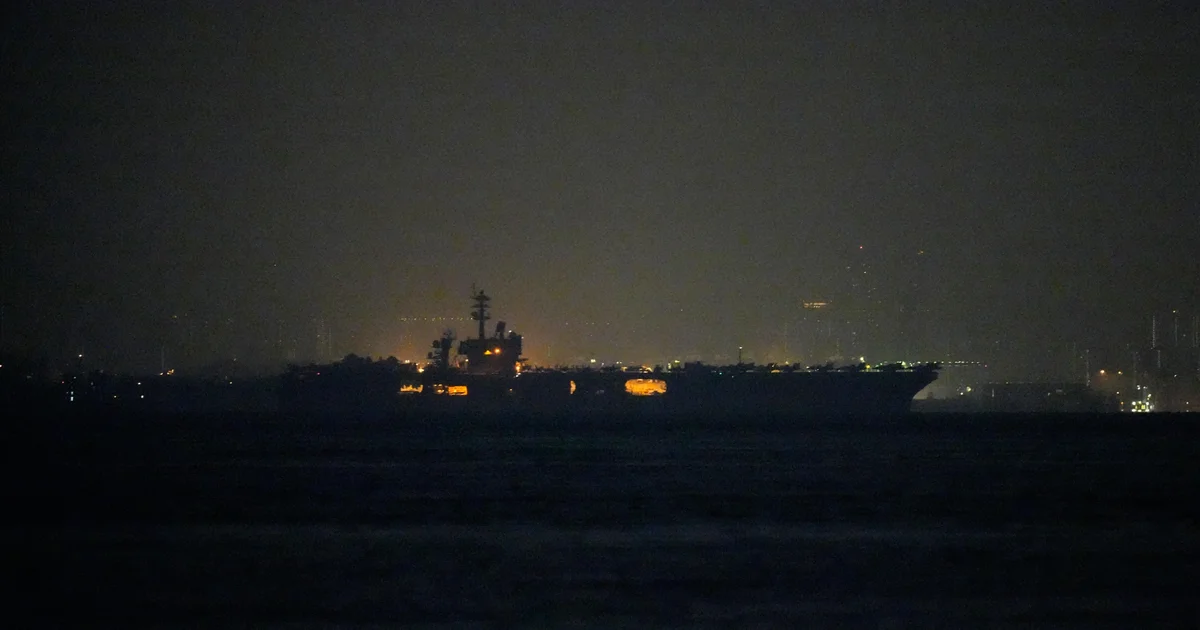 USS Lincoln passes Singapore after nine month deployment